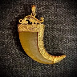 This is one of the most popular South Indian Jewellery- Tiger Nail Pendant , especially worn by men. Here the tiger nail was provided by the customer.